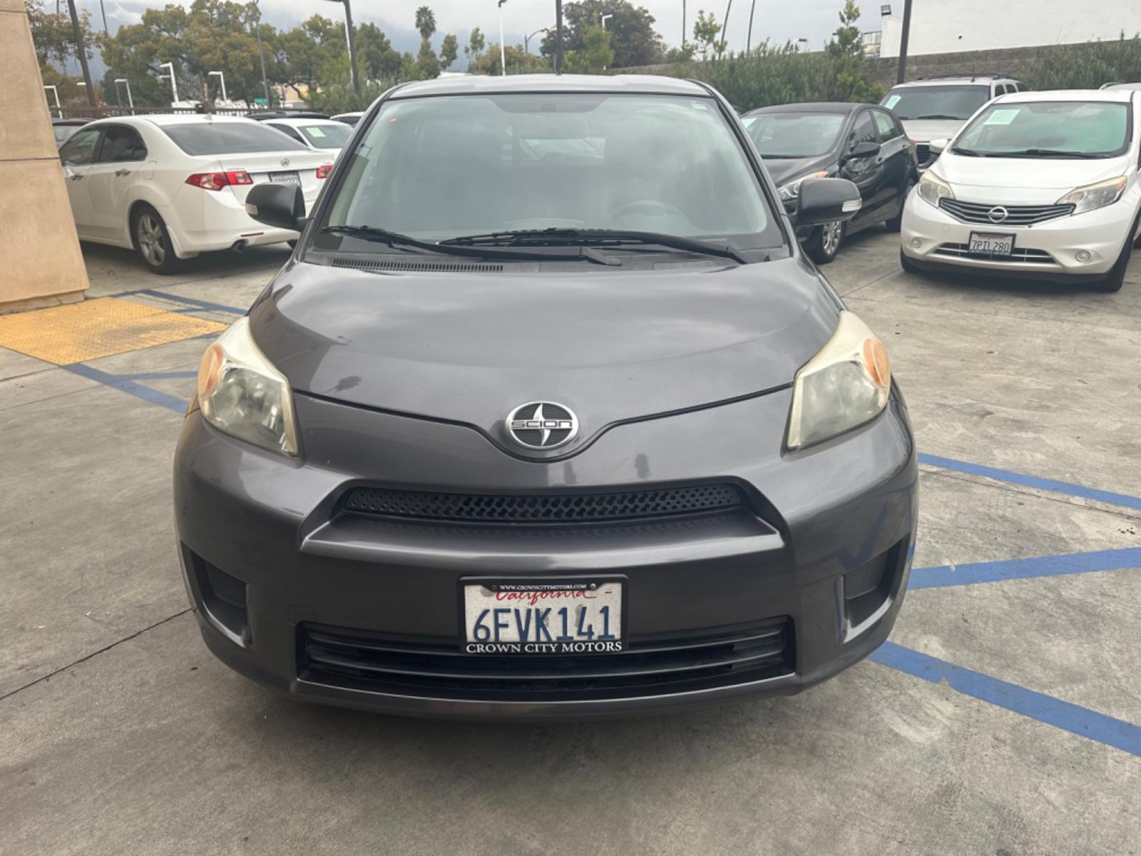 2009 Gray /Black Scion xD 5-Door (JTKKU104X9J) with an 1.8L L4 DOHC16V engine, automatic transmission, located at 30 S. Berkeley Avenue, Pasadena, CA, 91107, (626) 248-7567, 34.145447, -118.109398 - The 2009 Scion XD 4-Door Hatchback is a compact, versatile, and stylish vehicle that offers an exceptional driving experience. Located in the heart of Pasadena, CA, our dealership specializes in a comprehensive selection of used BHPH (Buy Here Pay Here) cars, including the dynamic Scion XD. This veh - Photo #5
